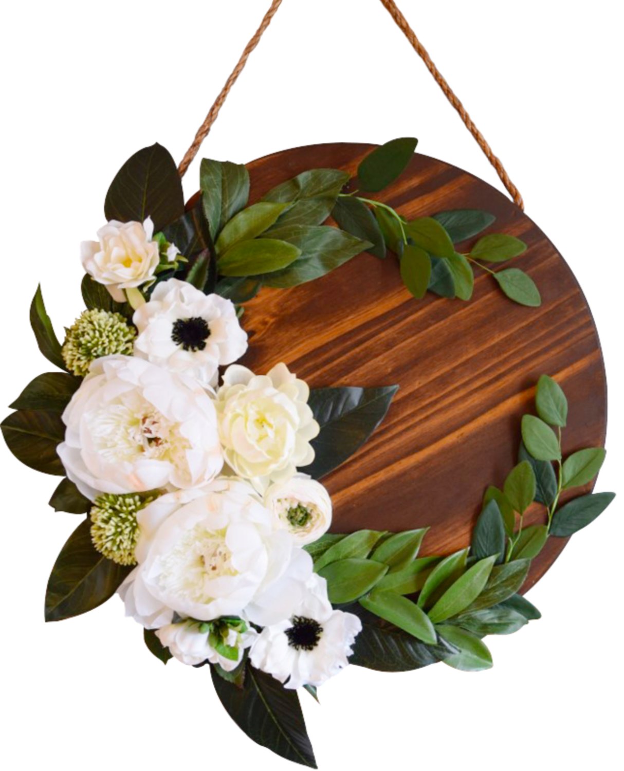 Thanks to a wide mix of faux fruits and florals, wreaths can be reused time and time again, inside or outside. The Bread and Butter Wreath, $129.